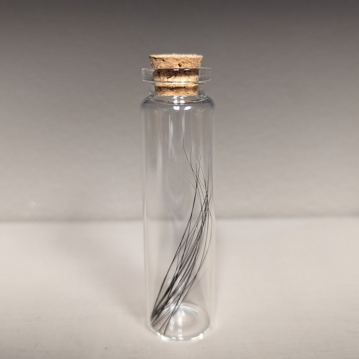 Whiskers in Glass Bottle - $19